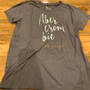Grey Tee With Silver Word Lining